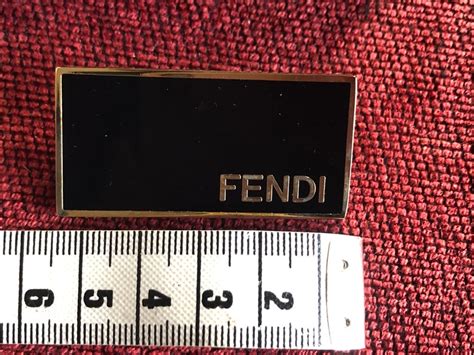 fendi employee gift fur pin|Pom.